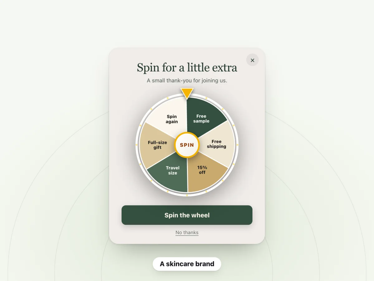 A spin-to-win pop-up for a skincare brand titled "Spin for a little extra"